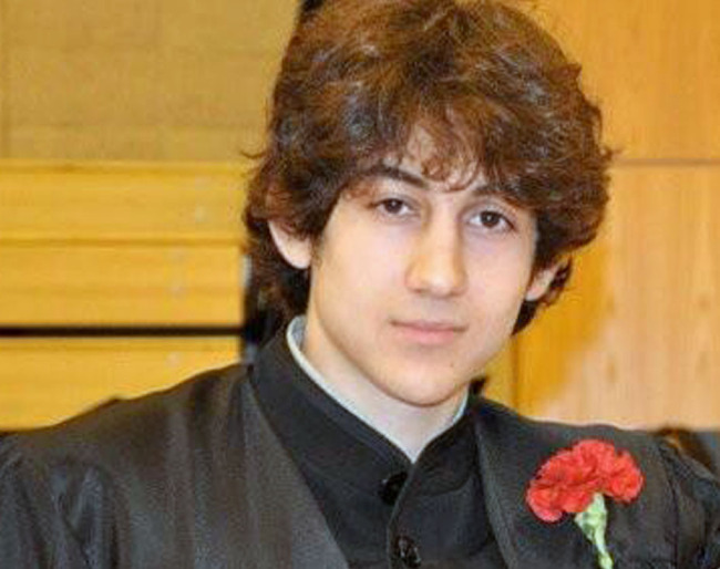 Dzhokhar A. Tsarnaev, poses for a photo after graduating from Cambridge Rindge and Latin High School. Tsarnaev has been identified as the surviving suspect in the marathon bombings. (AP-Yonhap News)