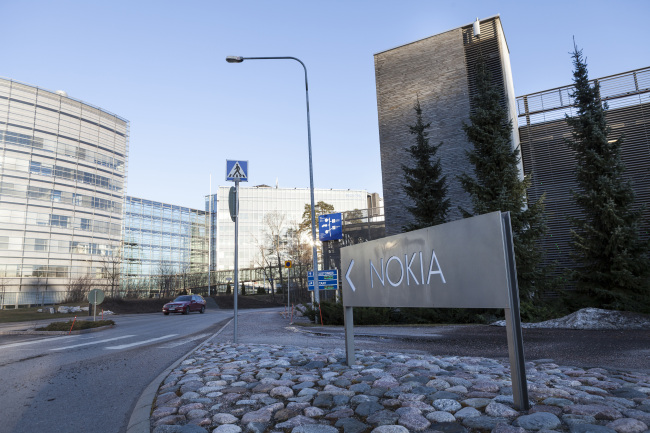 A sign stands at the entrance to the Nokia headquarters in Espoo, Finland. (Bloomberg)