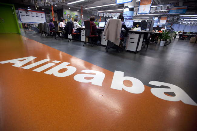 Employees work at Alibaba.com Ltd.’s headquarters in Hangzhou, Zhejiang Province, China. (Bloomberg)