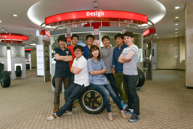 Designers at Kumho Tire pose at the company’s research and development center in Gwangju. (Kumho Tire)