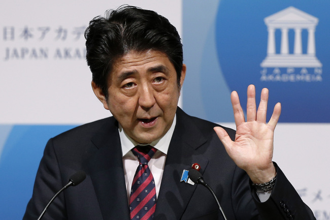 Shinzo Abe, Japan’s prime minister, gestures as he delivers a speech at an event hosted by Japan Akademeia in Tokyo on May 17. (Bloomberg)