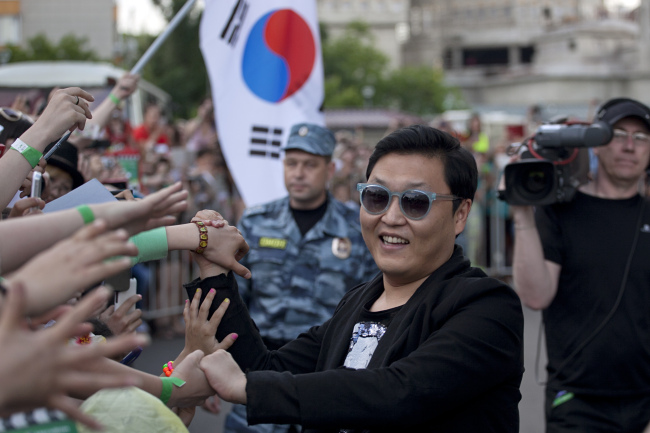 Korean singer Park Jae-sang, better known as Psy, is pictured outside Olimpiysky Sports Complex prior to a press conference for his Moscow concert. (ITAR-TASS-Yonhap News)