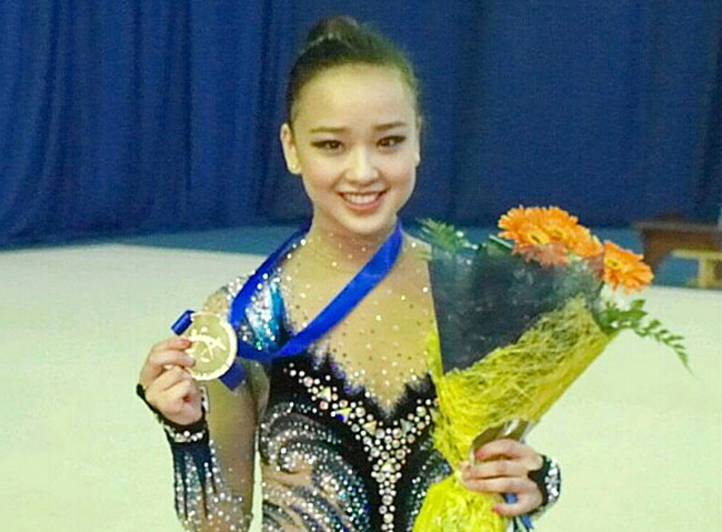 Son Yeon-jae poses with the gold medal after winning the individual all-around final at the Asian Rhythmic Gymnastics Championships in Tashkent, Uzbekistan.(Yonhap News)