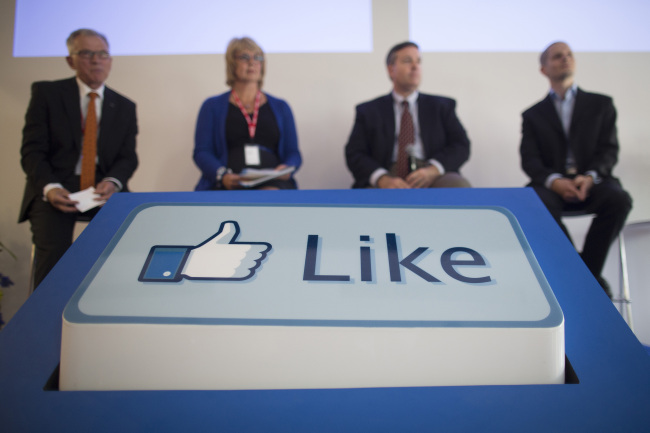 A Facebook “Like” button sits on display in front of visitors during a news conference inside Facebook Inc.’s new data storage center near the Arctic Circle in Lulea, Sweden, Wednesday. (Bloomberg)