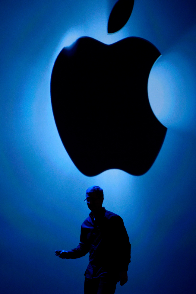 Tim Cook, chief executive officer at Apple Inc., exits the stage after speaking during the keynote of the World Wide Developers Conference in San Francisco, California, June 10. (Bloomberg)