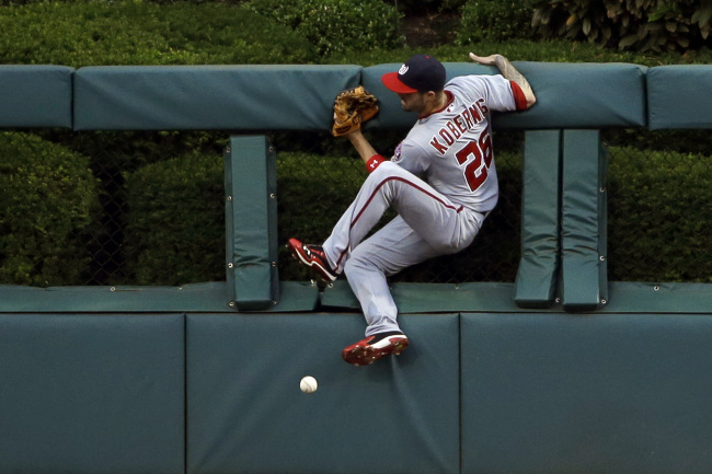 Washington Nationals’ Jeff Kobernus cannot reach a triple by Philadelphia Phillies’ Michael Young in the third inning on Monday. (AP-Yonhap News)