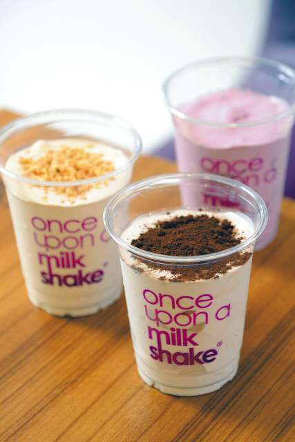 Once Upon a Milkshake’s peanut butter (clockwise from left), real blackcurrant and tiramisu milkshakes. (Ahn Hoon/The Korea Herald)