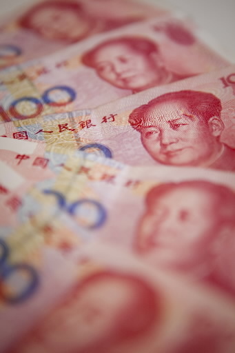 100-yuan banknotes are arranged for a photo in Beijing. (Bloomberg)