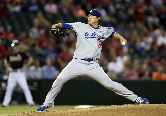 Los Angeles Dodgers starting pitcher Ryu Hyun-jin delivers against the Arizona Diamondbacks on Wednesday. The Korean lefty surrendered five earned runs in five innings of work. (AFP-Yonhap News)