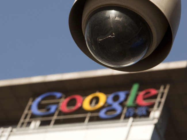 A security camera is mounted near the Google Inc. China headquarters in Beijing. (Bloomberg)