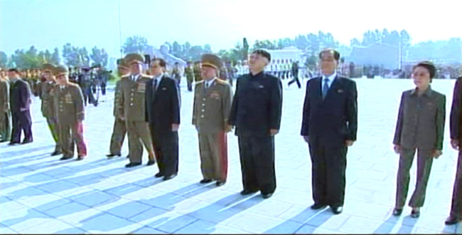 The North’s Korean Central Television shows Kim Kyong-hui (right), the aunt of North Korean leader Kim Jong-un (third from right), attending a ceremony marking the completion of a national cemetery in Pyongyang last Thursday. (Yonhap News)