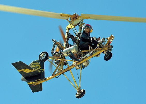 Shu Bin, a machine repairer from east China’s Zhejiang province, flies his homemade helicopter, powered by a glider engine, during the Air Nadaam festival in Hexigten, Inner Mongolia, on July 28. (AFP-Yonhap News)