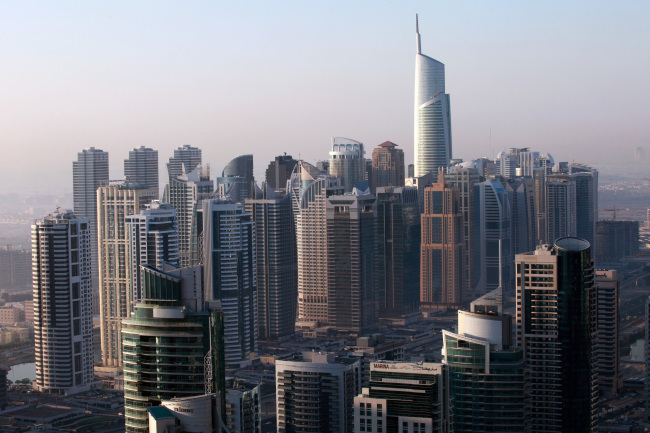 The Almas tower stands above other skyscrapers at the Jumeirah Lake Towers development in Dubai. (Bloomberg)