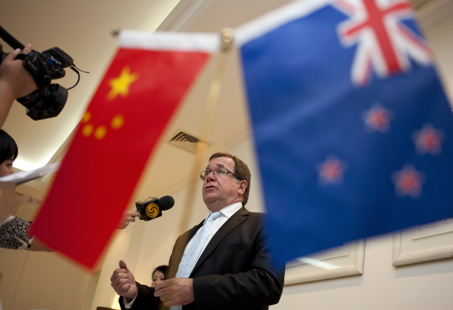 New Zealand Foreign Minister Murray McCully speaks to a journalist during a group interview in Beijing on Thursday. (AP-Yonhap News)