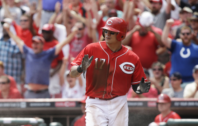 Cincinnati Reds outfielder Choo Shin-soo celebrates after scoring on a wild pitch in the eighth inning. (AP-Yonhap News)