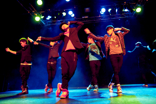 A cover-dance group performs Korean boy band Super Junior's 