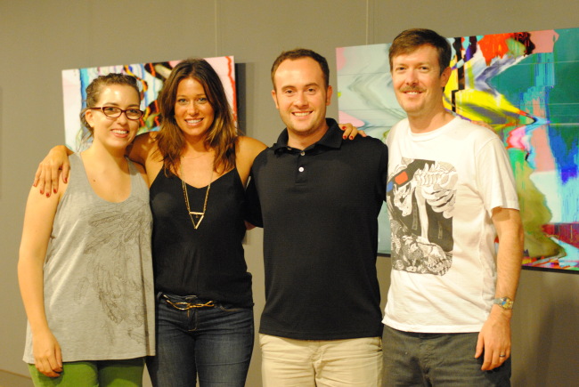 (B)racket magazine staff (from left) Lisa Highfill, Sharon Reichstadter, Chris Cote and Jess Hinshaw pose while preparing for the magazine’s (b)list exhibition that opened Tuesday. Cote and Hinshaw have work on display in the show. ((b)racket)