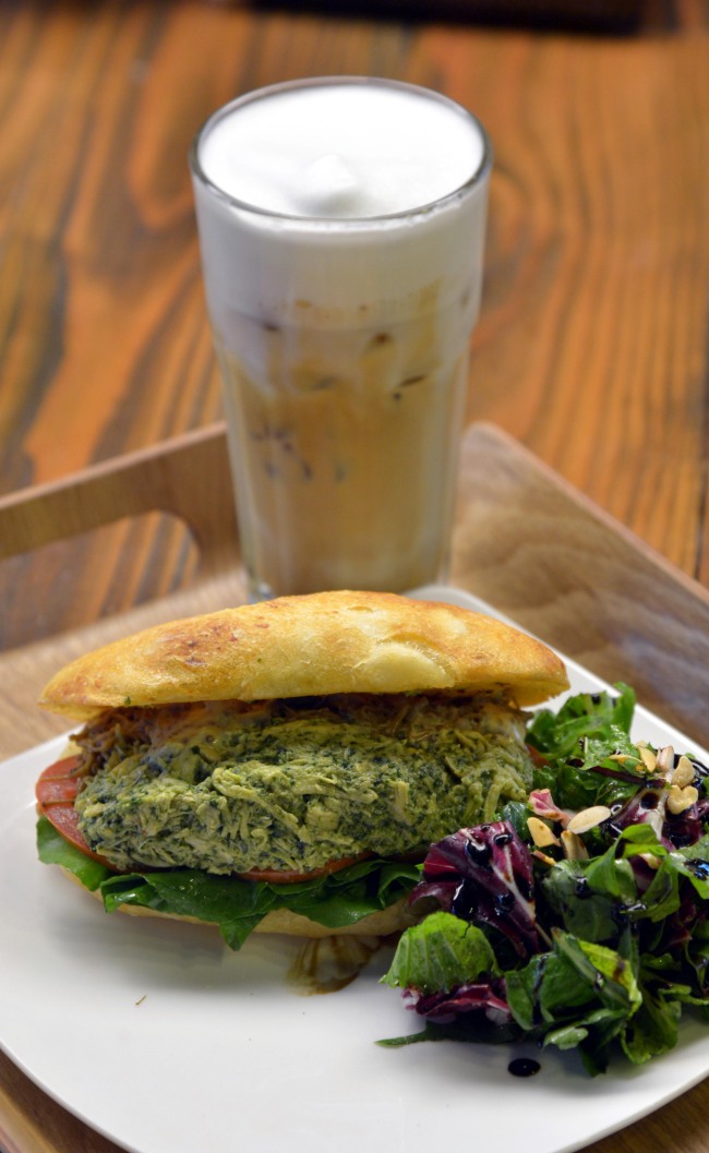 The Barn’s chicken breast and mushroom sandwich — crafted from artisanal potato ciabatta, basil pesto chicken and sauteed mushrooms — is served with a light salad. (Kim Myung-sub/The Korea Herald)