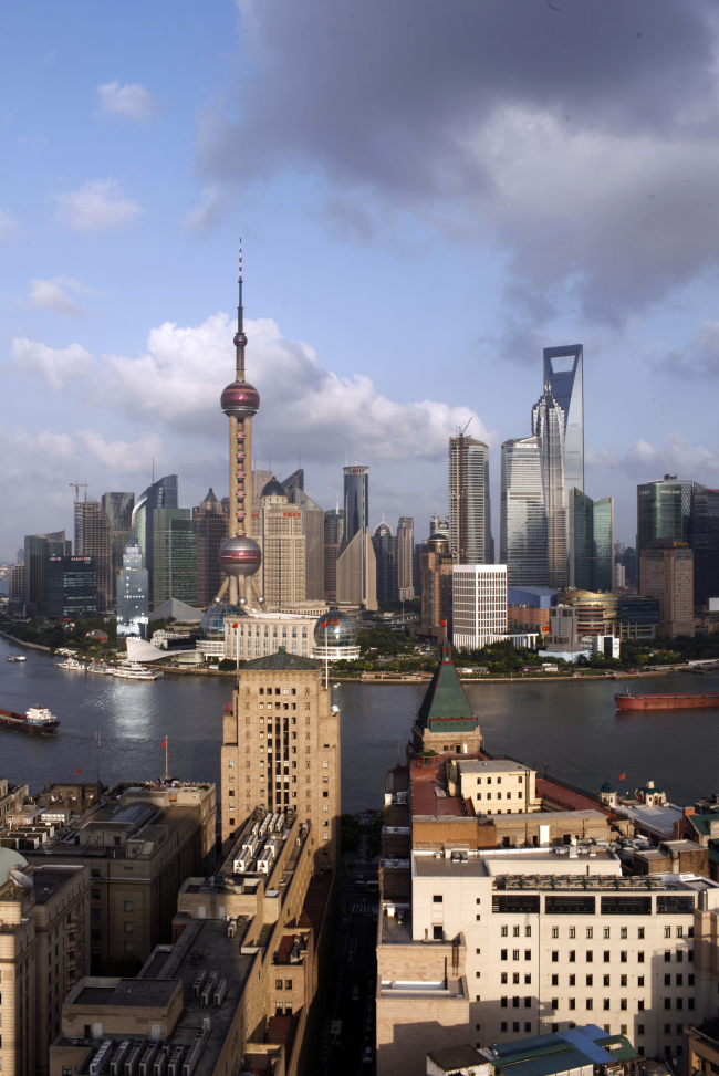 The historic Bund sits in the foreground with the Lujiazui financial district on the other side of the Huangpu river in Shanghai. (Bloomberg)