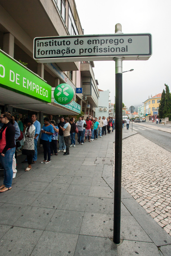 Job seekers queue to enter an employment center in Sintra, Portugal. (Bloomberg)