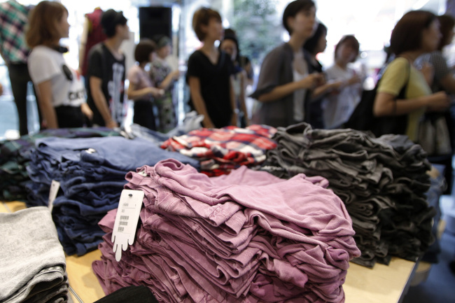 Customers enter a Monki fashion store in the Harajuku shopping district in Tokyo. (Bloomberg)