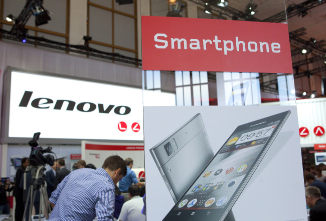 An advertisement hoarding for a K900 smartphone, manufactured by Lenovo Group Ltd., stands on display during the IFA consumer electronics show in Berlin on Sept. 5. (Bloomberg)