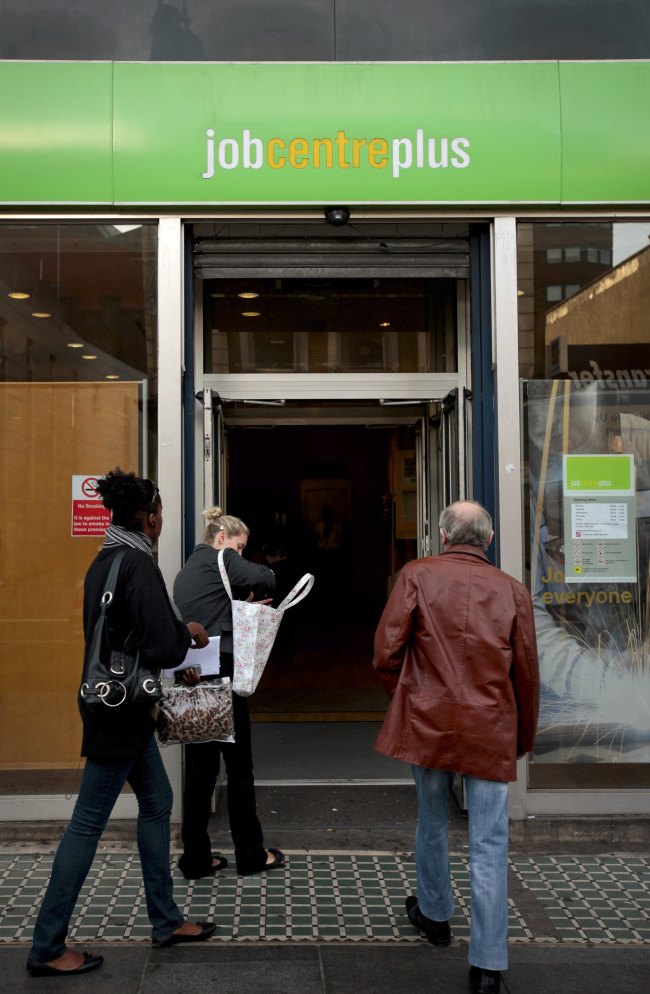 Jobseekers enter an employment center in London. (Bloomberg)