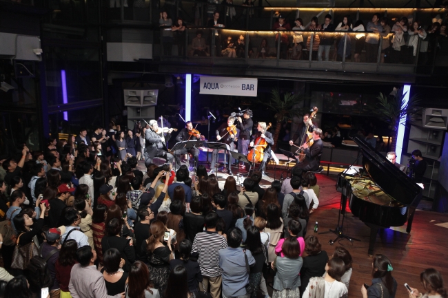 The Philharmonics members perform at the Yellow Lounge concert at Club Octagon in southern Seoul on Oct. 3. (Universal Music)