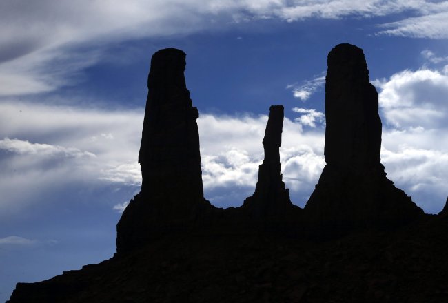 Monument Valley stretches across the Utah-Arizona border characterized by majestic red buttes, mesas and grand vistas like the “Three Sisters” formation. (Los Angeles Times/MCT)