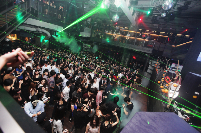 The crowd dances the night away at Octagon’s Halloween party last year. (Octagon)