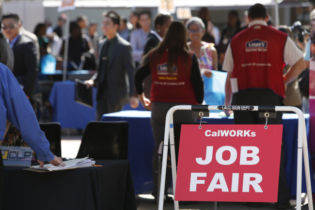 CalWORKs job fair signage is displayed during the Fall Classic Hiring Spree event at Los Angeles City College on Oct. 10. (Bloomberg)