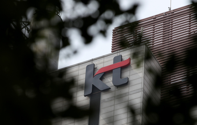 The KT Corp. logo is displayed atop one of the company’s branches in Seoul. (Bloomberg)