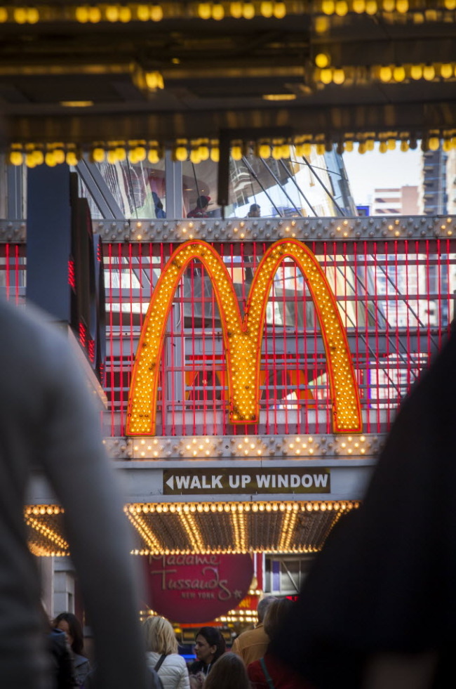 Pedestrians pass a McDonald’s restaurant in Times Square in New York. (Bloomberg)