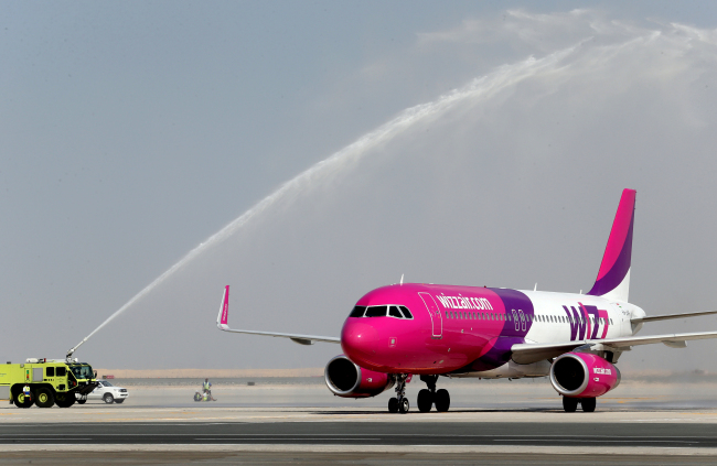 Wizz Air lands at the newly opened Al Maktoum International Airport in Dubai on Sunday. (AP-Yonhap News)