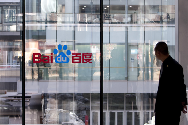 The Baidu Inc. logo is displayed on a window at the company’s headquarters in Beijing. (Bloomberg)