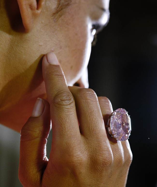 A file picture taken on September 25, 2013 during a press preview shows a model displaying the 