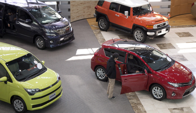 Toyota Motor Corp. vehicles are displayed in the showroom at the company’s headquarters in Toyota City, Aichi prefecture, Japan. (Bloomberg)