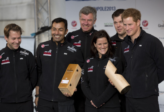 Britain’s Prince Harry (right) poses on stage with his teammates during the “Walking With The Wounded South Pole Allied Challenge” departure event in Trafalgar Square, London, Thurday. (AP-Yonhap News)