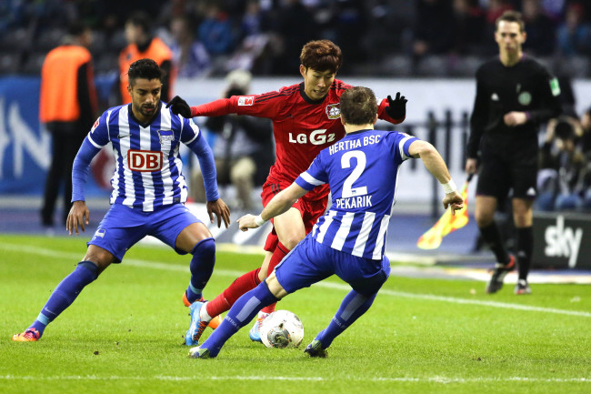 Leverkusen’s Son Heung-min controls the ball against Hertha Berlin on Saturday. (AP-Yonhap News)