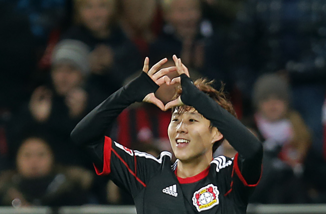 Bayer Leverkusen’s Son Heung-min celebrates the first of his two goals against FC Nuremberg on Saturday.(AP-Yonhap News)