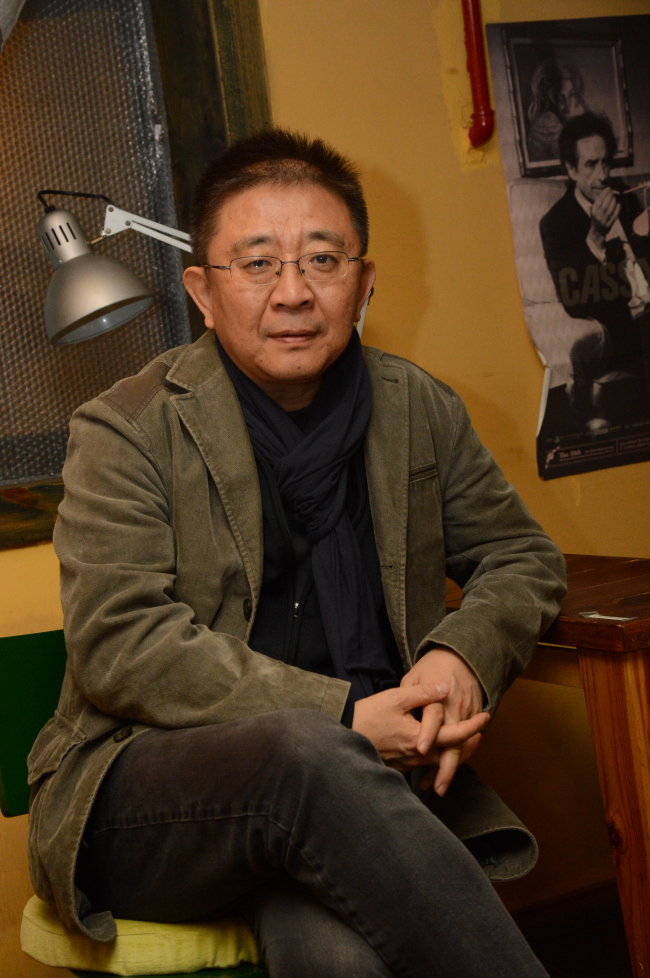 Filmmaker Zhang Lu poses for a photo during an interview with The Korea Herald in Seoul, Dec. 4. (Chung Hee-cho/The Korea Herald)