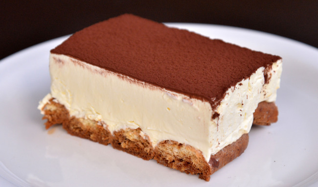 Cafe 8’s tiramisu is crafted from ladyfingers soaked in espresso and Kahlua, topped with a blend of Mascarpone cheese and fresh cream, and crowned with Valrhona cacao powder. (Lee Sang-sub/The Korea Herald)