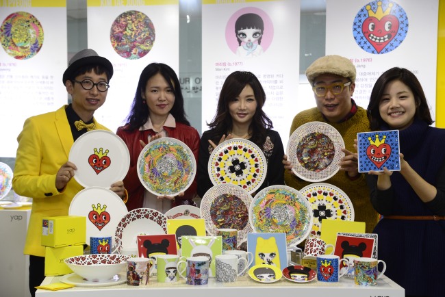 A group of young artists collaborated with Hankook Chinaware on a set of ceramics called “YAP,” which they unveiled at the company’s shop in western Seoul on Tuesday. (Park Hae-mook/The Korea Herald)