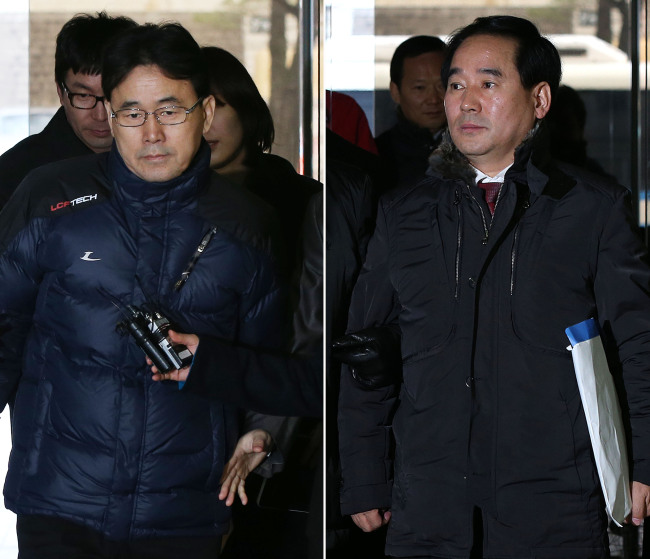 Cho Oh-young (left), an administrative official at Cheong Wa Dae and Cho E-jae, a director at Seocho-gu Office, enter Seoul Central District Court on Tuesday to attend a hearing to examine the two officials’ arrest warrants sought by the prosecution. The two are suspected of illegally accessing personal information of a boy alleged to be the illegitimate son of former Prosecutor General Chae Dong-wook. (Yonhap News)