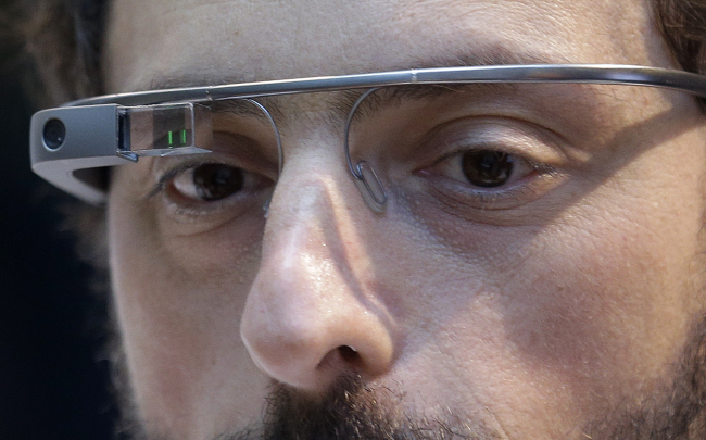 Google co-founder Sergey Brin wears a Google Glass device. (AP-Yonhap News)