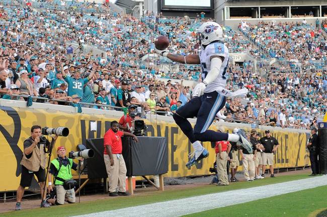 Tennessee Titans receiver Nate Washington celebrates his touchdown on Sunday. (AFP-Yonhap News)