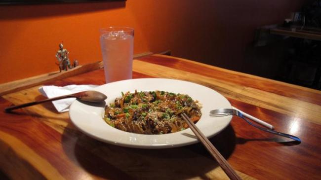 Sweet potato noodles, carrots, mushrooms and onions in a spicy sauce at Crazy Noodle restaurant in Memphis, Tennessee. (AP)