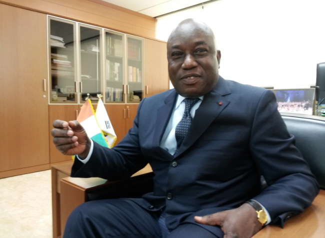 Cote d’Ivoire Ambassador to South Korea Sylvestre Bile gestures during an interview with The Korea Herald at his office in Hannam-dong, Seoul, in early December. (Philip Iglauer/The Korea Herald)