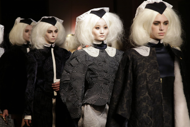 Models walk on the runway at the Thom Browne fashion show for fall 2014 collections at Mercedes-Benz Fashion Week in New York City on Monday. UPI-Yonhap