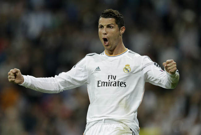 Real Madrid’s Cristiano Ronaldo celebrates his goal against Schalke on Tuesday. (AP-Yonhap)